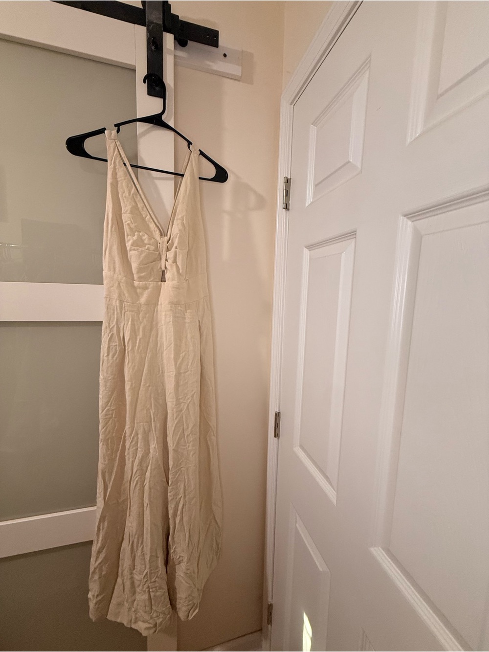 Sleeveless V-Neck Cream Jumpsuit with Tie Front